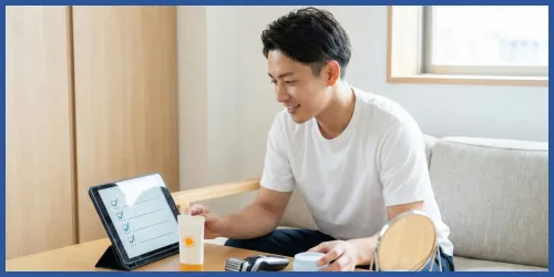 メンズ脱毛の施工前に準備をしている男性の様子